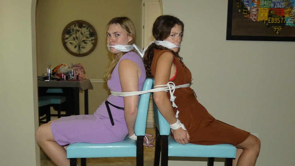 Tyler Lynn and Nathalia chair tied back to back