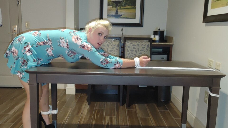 Amanda Bryant Bent over the table